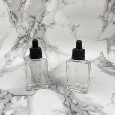Τετραγωνικό 30ml Dropper ακίνδυνη για τα παιδιά ΚΑΠ μπουκαλιών γυαλιού καλλυντικό για το πετρέλαιο προσοχής τρίχας