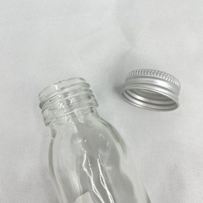 Καλλυντικό συσκευάζοντας 60ml μπουκάλι γυαλιού φροντίδας δέρματος μη χυσιμάτων με το αργίλιο ΚΑΠ